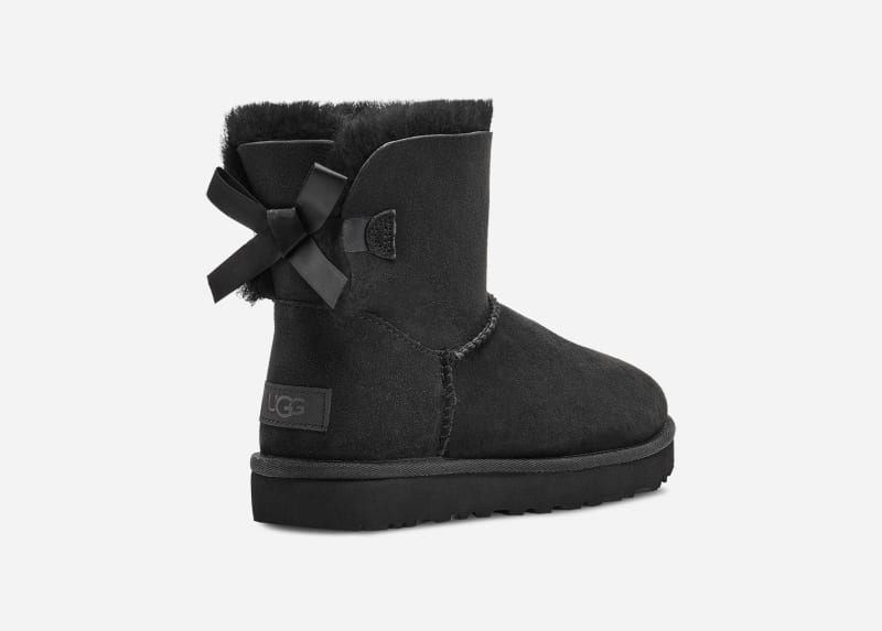 UGG® Mini Bailey Bow II Boot for Women in Black, Size 3, Suede
