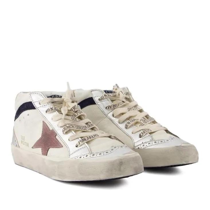 Golden Goose Sneakers - Mid Star Sneakers - Leather - White in wit