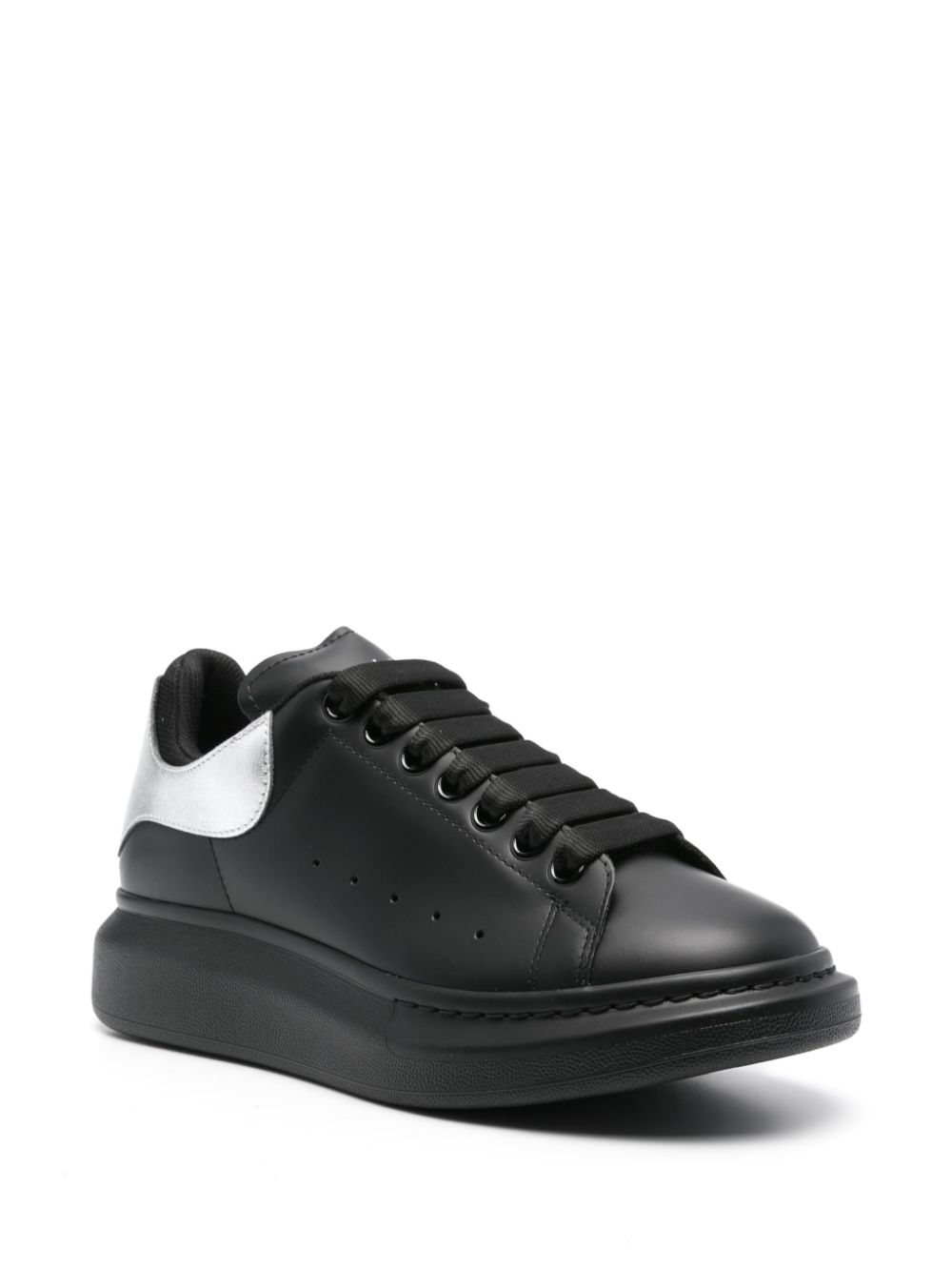 Alexander McQueen Oversized leren sneakers - Zwart