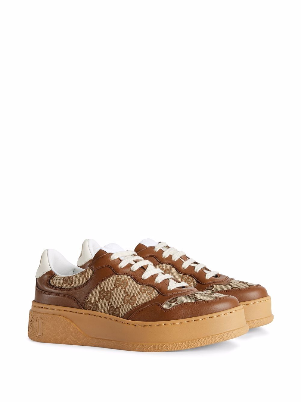 Gucci Sneakers met logo-reliëf - Bruin