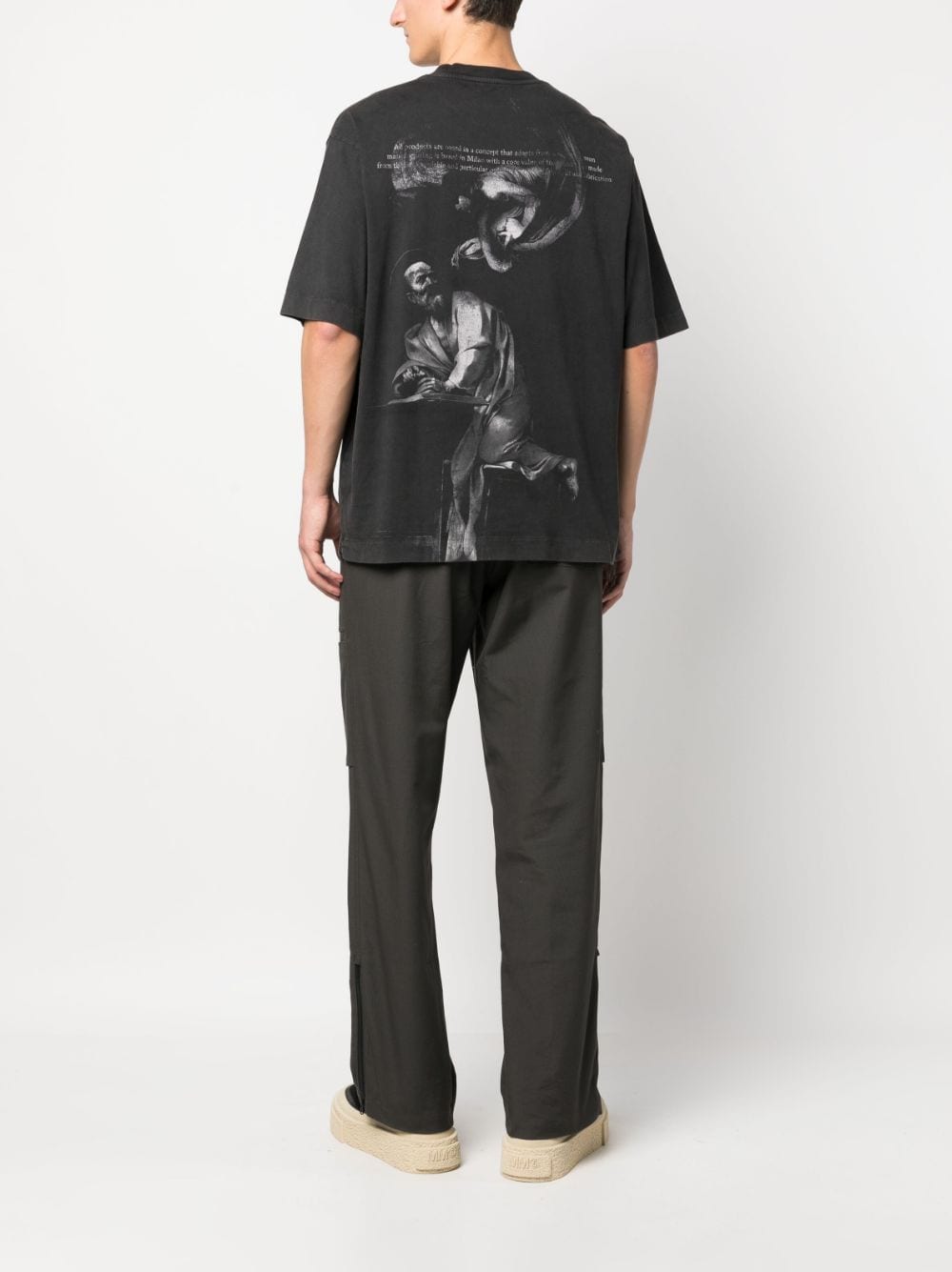 Off-White T-shirt met mensenprint - Zwart